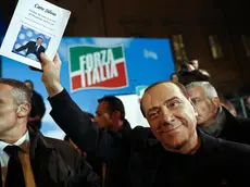 Italy's former Prime Minister Silvio Berlusconi after a speech outside Palazzo Grazioli, his private residence, in Rome, 27 November 2013. Italy's parliament prepared to expel Silvio Berlusconi today over his tax fraud conviction in a momentous move that raises the risk of his arrest but is unlikely to end his tumultuous career. Thousands of Berlusconi loyalists massed outside the three-time former prime minister's luxury home in Rome to support their leader, as lawmakers from his party took the floor of the Senate one by one to back him. ANSA/GUIDO MONTANI