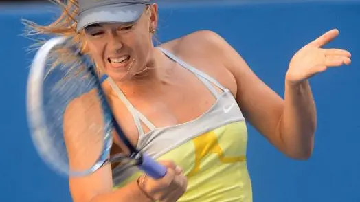 epa03538295 Maria Sharapova of Russia in action during her match against Misaki Doi of Japan, in round two of the Australian Open tennis tournament in Melbourne, Australia, 16 January 2013. EPA/JULIAN SMITH AUSTRALIA AND NEW ZEALAND OUT