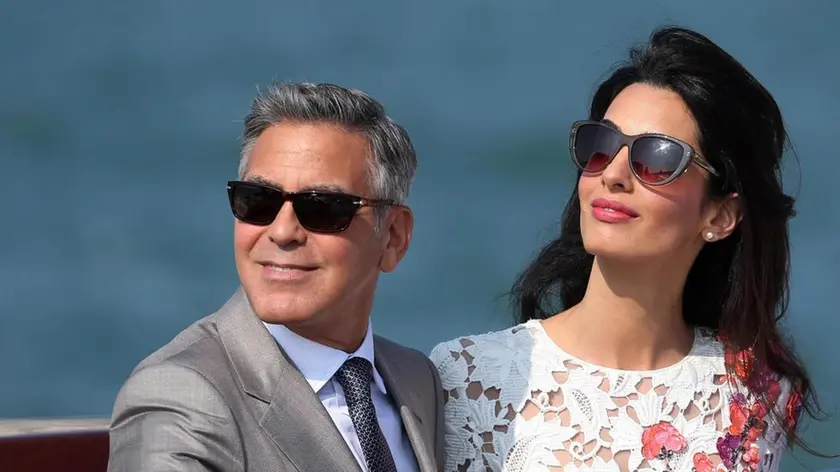 George Clooney and Amal Alamuddin on a boat the day after the day of their wedding, in Venice, Italy, 28 September 2014..ANSA/ALESSANDRO DI MEO