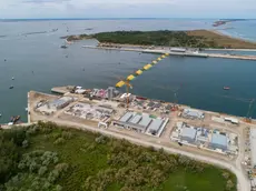 epa08456496 A handout photo made available by Consorzio Venezia Nuova Press Office, shows a moment of the simultaneous double lifting of the ranks of 37 sluices of the Mose, to the mouths of port of Chioggia (south lagoon) and Malamocco, in Venice, Italy, 31 May 2020. After years of projects, waiting and obstacles (including judicial), now the Mose is in the home stretch, and from next autumn could finally come into operation (at the time in emergency) to prevent the exceptional high waters from reaching St Mark??s Square. EPA/CONSORZIO VENEZIA NUOVA PRESS OFFICE /HANDOUT HANDOUT EDITORIAL USE ONLY/NO SALES