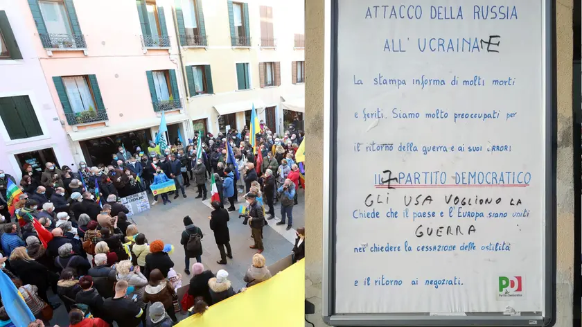 Il manifesto imbrattato e una manifestazione per la pace in Ucraina