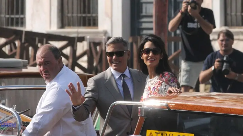 Interpress/Mazzega Morsego Venezia, 28.09.2014.- ore 14.55 l'ucita di George e Amal Clooneyd in Taxi "Amore" per l'Hotel Cipriani Giudecca