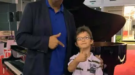 BARON - AGENZIA BIANCHI - PADOVA - PIANISTA BAMBINO IN FIERA. GLAVINIC MATTIAS. ALBERTO BETTIN