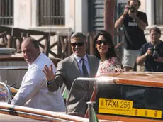 Interpress/Mazzega Morsego Venezia, 28.09.2014.- ore 14.55 l'ucita di George e Amal Clooneyd in Taxi "Amore" per l'Hotel Cipriani Giudecca